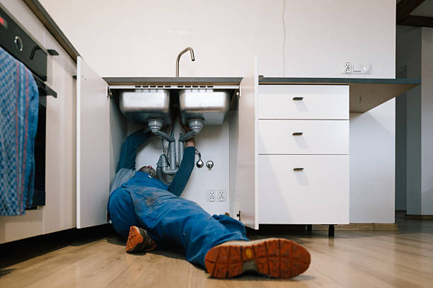 Professional Plumbing technician working in Dover, OH